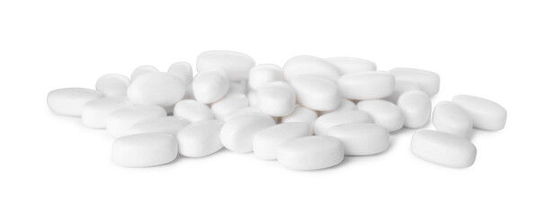 Tasty mint dragee candies on white background