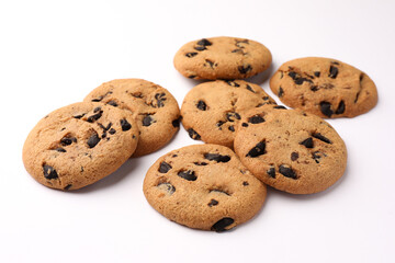 Delicious chocolate chip cookies on white background