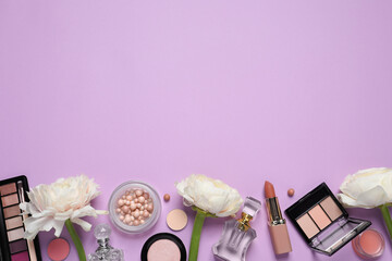 Flat lay composition with different makeup products and beautiful flowers on violet background,...