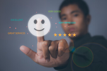 Man hand choosing happy smile face positive mindset selection for feedback review satisfaction service.