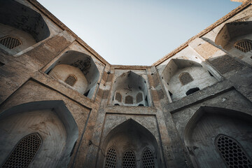 Old madrasah facade, historical building in Bukhara, Uzbekistan - 589367962