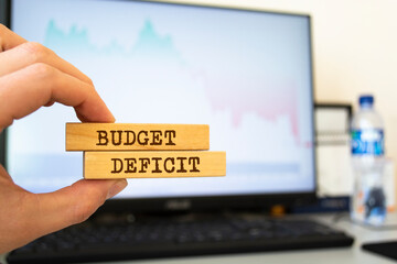 Wooden blocks with words 'Budget deficit'. Business concept