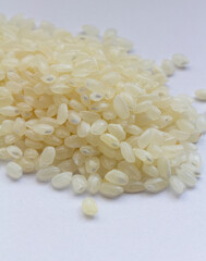 Sushi rice texture - top view and closeup on grains of raw rice for sushi