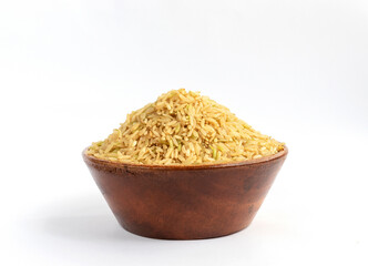 Brown rice in  bowl on a white background