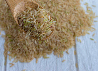 Brown rice is a whole grain rice with the inedible outer hull removed.
