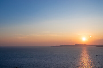 Naklejka na ściany i meble sea with sunset sky. Meditation ocean and sky background. Colorful horizon over the water