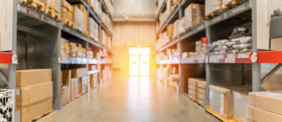 Naklejka na ściany i meble Blur large warehouse products goods stock factory inventory storage area for background