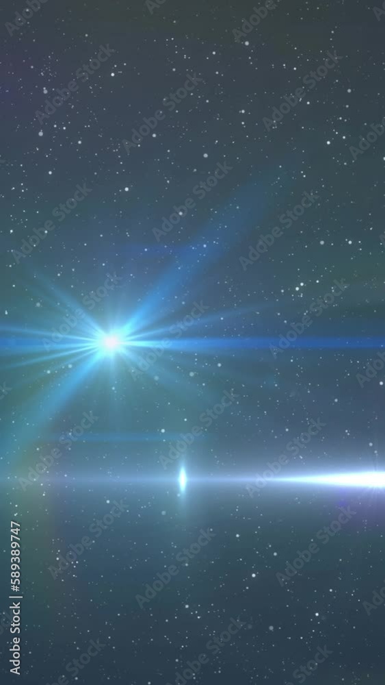Wall mural animation of glowing blue light moving over spots of light and stars in background