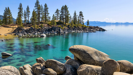 Sand Harbor - A panoramic view of a colorful rocky cove at Sand Harbor on a calm sunny Spring day....