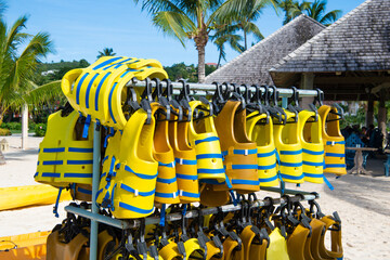 safety lifejacket on rack. safety lifejacket at the beach. safety lifejacket outdoor.