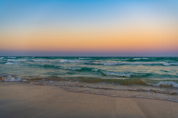 Fototapeta na wymiar nature sunset with sea. nature sunset seascape. photo of nature sunset. nature sunset at beach