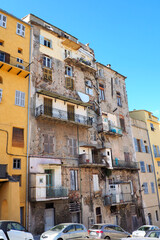 Fototapeta na wymiar In the old town of Bastia, in Corsica, nicknamed the Island of Beauty, some very old buildings have reached a level of degradation which limits insecurity for its inhabitants