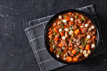 boneless beef short ribs stew in black bowl