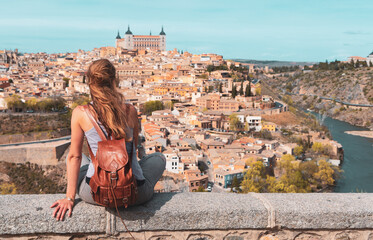 Fototapeta premium Woman tourist in Toledo looking at panoramic view of city- Spain