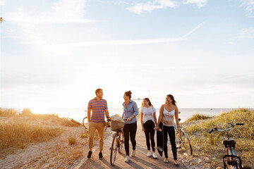 Friends on beach footpath