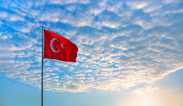 Turkish flag waving in amazing cloudy sky