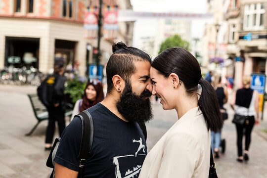 Happy couple in city street