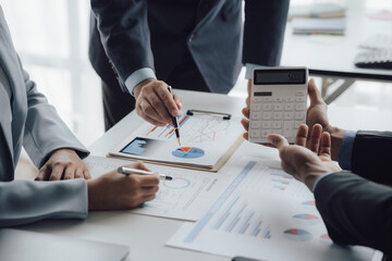 business adviser meeting to analyze and discuss the situation on the financial report in the meeting room.Investment Consultant, Financial advisor and accounting concept