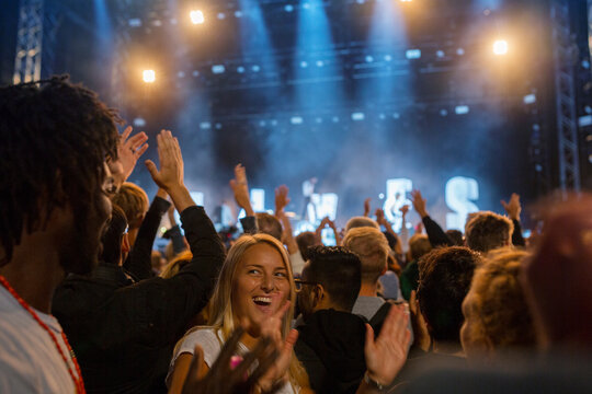Friends having fun at music concert