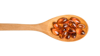 fish oil on wooden spoon isolated