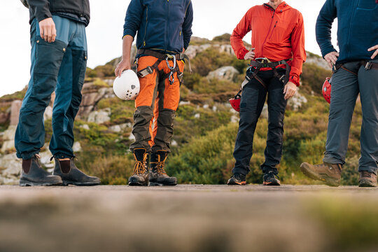 Man in hiking clothes standing on road