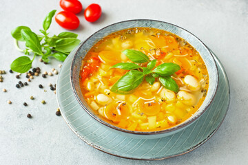  Ceramic bowl of minestrone soup with  noodle