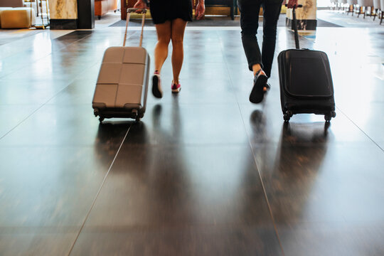 People walking with luggage