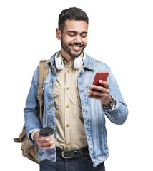 Young handsome man with backpack looking at smart phone and holding coffee cup isolated transparent PNG, Smiling student going on travel - obrazy, fototapety, plakaty