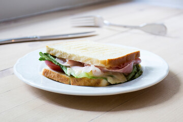 Delicious sandwich with bacon in mollete bread