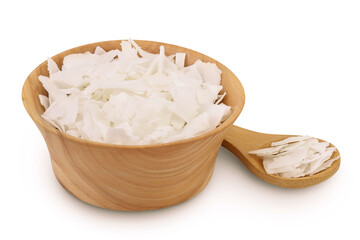 Coconut flakes or chips in wooden bowl isolated on white background with full depth of field