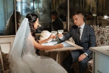 bride and groom inside a cocktail bar