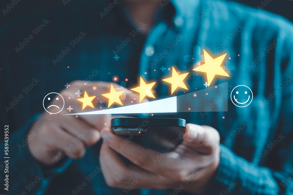 Poster businessman use smartphone to give five glowing golden stars for excellent evaluation survey after c