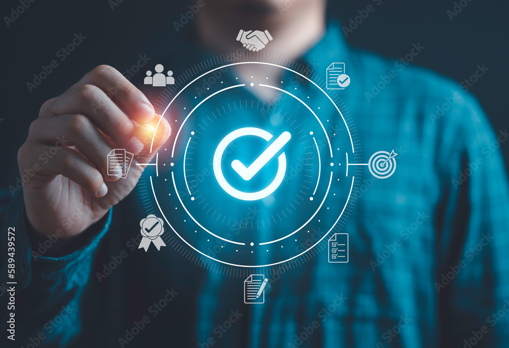 Aufkleber businessman writing glowing correct sign or tick mark for quality control assurance iso standard and