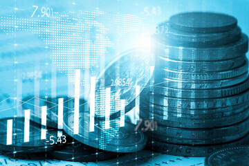 Coin stacking with stock market chart graph for currency exchange of global trade forex and stock...