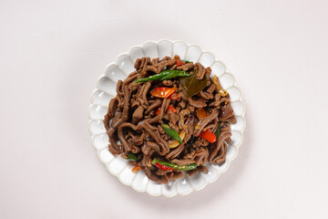 Tumis Usus is Stir Fry Chicken Intestine with Soy Sauce.