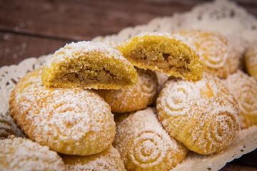 Traditional eid maamoul or mamoul cookies with dates, nuts, and jam, Arabic sweets for Aid al-Fitr and easter, High quality photo