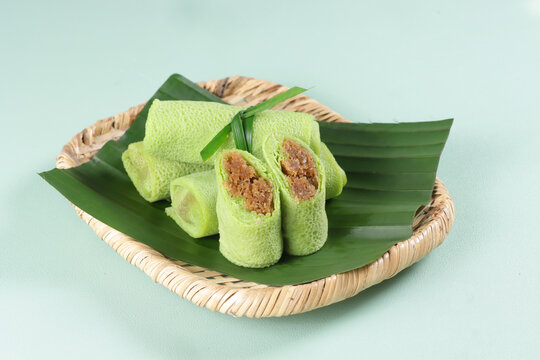 Kuih Ketayap in Malaysia or Dadar Gulung in Indonesia is a Roll Crepes Filled with Grated Coconut and Palm Sugar.