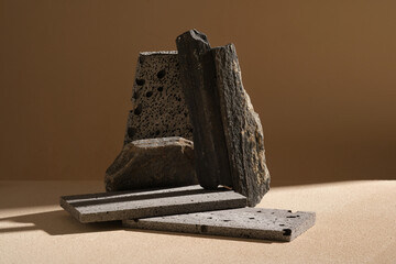 Minimal rectangle stone podium decorated with rocks on beige background. Blank space for product presentation © Tuan  Nguyen 