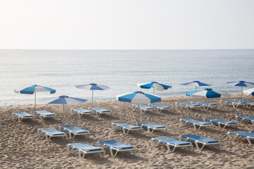 Sun Loungers set out on Beach, Villajoyosa, Alicante; Spain