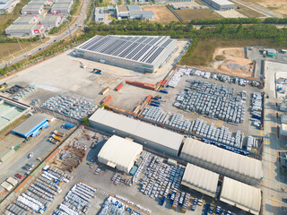 Aerial top view of industry factory in urban city town. Inventory import and export business...