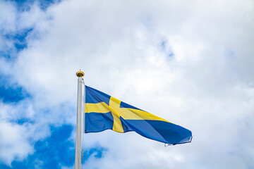 National flag of Sweden waving in the wind.