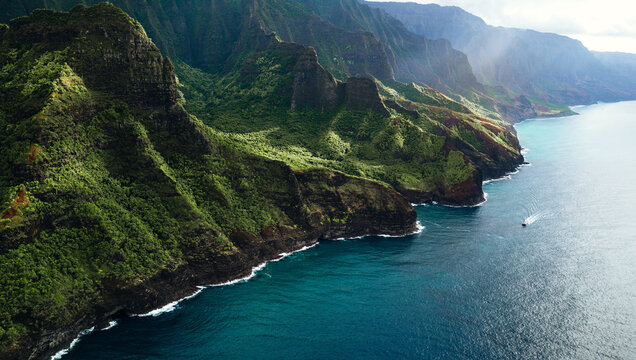 Green mountains and peaceful waters along Na Pali a Hawaiian travel destination