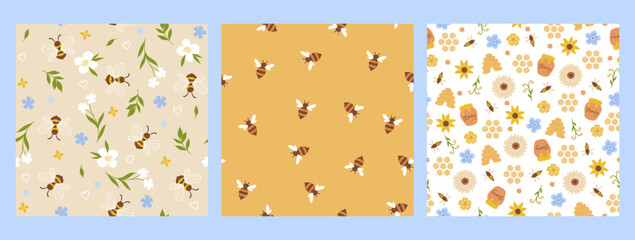 Set of seamless patterns with bees and flowers. Vector graphics.