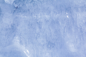 Obraz premium Texture of winter ice on a stone cliff. Blue natural ice background