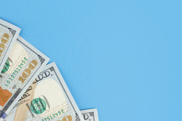 investment and trade, finance, inflation, banking, money background, american dollars banknotes cash on a blue background
