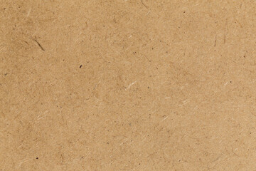 Pressed beige chipboard texture.