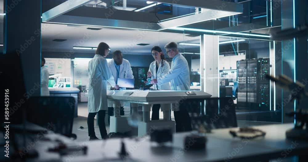 Aufkleber Team of Industrial Engineers Working on a Bionic Robot Arm at a Startup Factory. Multiethnic Male and Female Scientists Having a Conversation About an Electronic Component for a Humanoid AI Robot