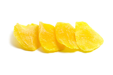 Dried mango slices isolated on white background. Candied mango fruit chips