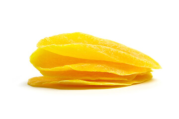 Fototapeta na wymiar Dried mango slices isolated on white background. Stack of dehydrated fruit chips. Candied mango