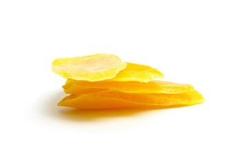 Fototapeta na wymiar Candied mango slices isolated on white background. Stack of dehydrated fruit chips